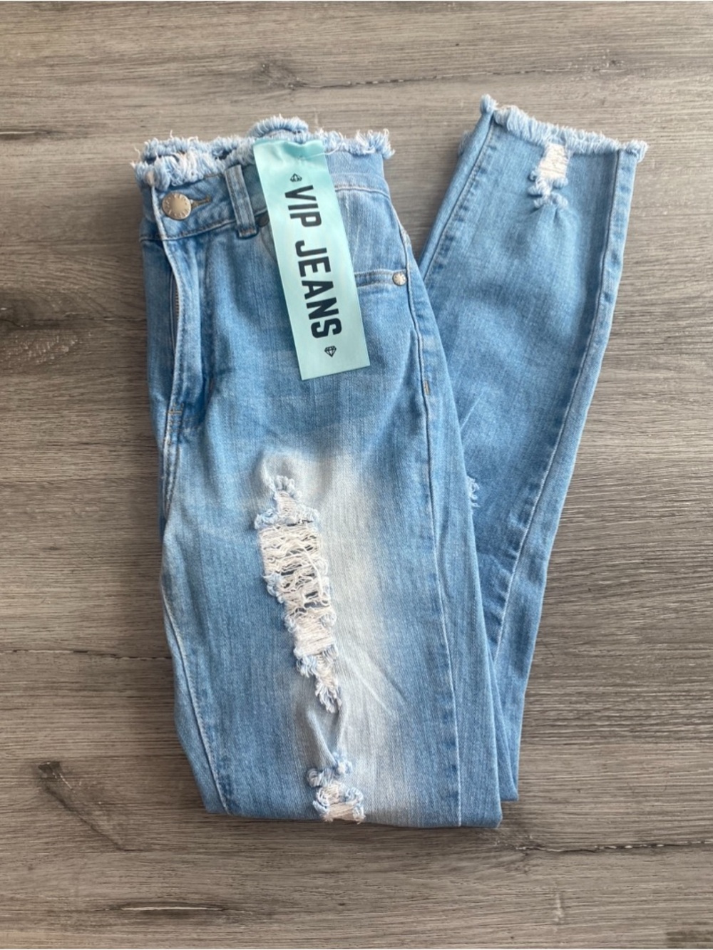 VIP Skinny Distressed Jeans in Light Blue Wash